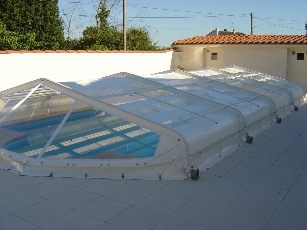 Buffalo pool enclosure partially opened